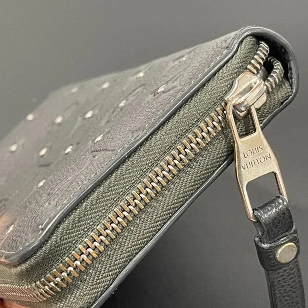 Louis Vuitton Zippy Wallet Monogram Empreinte Leather with Silver Studs (JB1040)